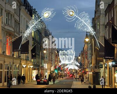 View looking up at the Christmas decorations in New Bond Street in the city of London 2020