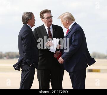 NO FILM, NO VIDEO, NO TV, NO DOCUMENTARY - Donald Trump greets Lt. Governor Dan Patrick and Texas Attorney General Ken Paxton at Austin Bergstrom International Airport on Wednesday, Nov. 20, 2019 before his visit to the Apple campus. Photo by Jay Janner/Austin American-Statesman/TNS/ABACAPRESS.COM Stock Photo