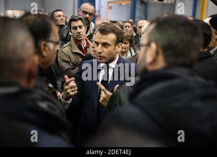 France's leftist party La France Insoumise (LFI) member of the Parliament, Francois Ruffin listens French President Emmanuel Macron talking with employees during his visit to the Whirlpool factory in Amiens, France, on November 22, 2019. Photo by Eliot Blondet/ABACAPRESS.COM Stock Photo