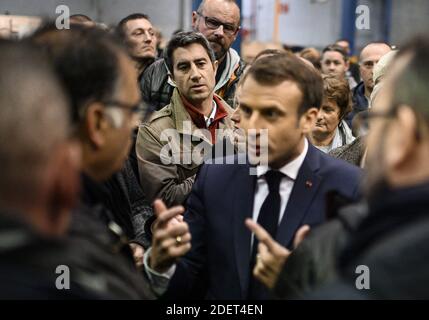 France's leftist party La France Insoumise (LFI) member of the Parliament, Francois Ruffin listens French President Emmanuel Macron talking with employees during his visit to the Whirlpool factory in Amiens, France, on November 22, 2019. Photo by Eliot Blondet/ABACAPRESS.COM Stock Photo