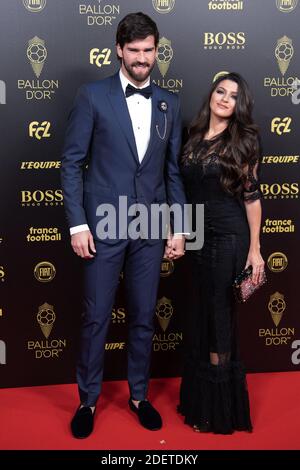 Liverpool goalkeeper Alisson Becker and wife Natalia Loewe arrive to attend the Ballon d Or France Football 2019 ceremony at the Chatelet Theatre on December 2, 2019 in Paris, France. Photo by David Niviere/ABACAPRESS.COM Stock Photo