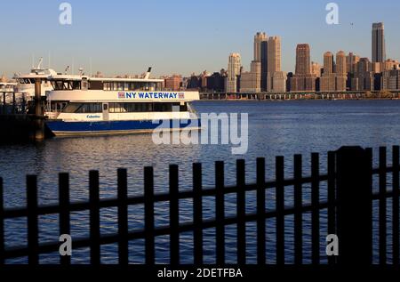 The view of Upper West Side of Manhattan and Hudson River from Port Imperial Ferry Terminal in Weehawken, New Jersey.USA Stock Photo