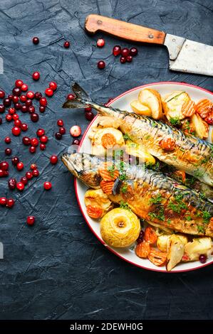 Delicious mackerel or scomber in apples and cranberry Stock Photo