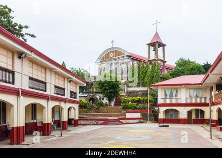 The town center of Culion with the Spanish colonial era church in Palawan, Philippines Stock Photo