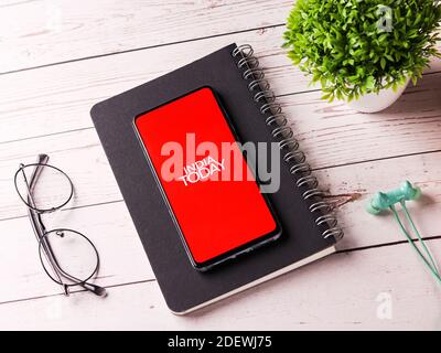 Assam, india - November 29, 2020 : India today logo on phone screen stock image. Stock Photo