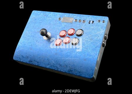 Vintage used arcade stick with joystick and tournament buttons and scratches Stock Photo