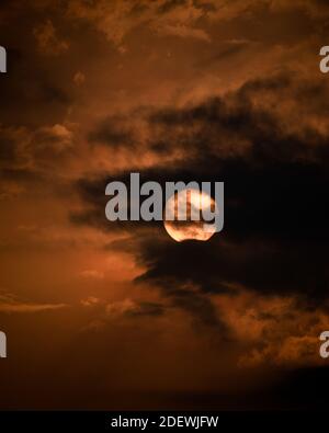 Sunset clouds with dark and Beautiful sky. After golden hour. Stock Photo