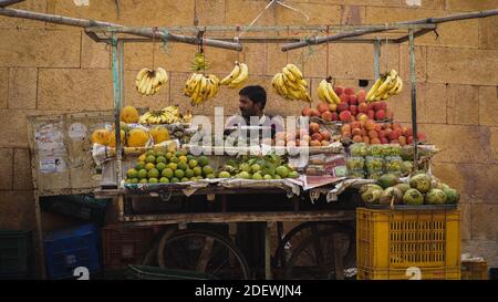 A salesman is waiting for customers in Jaisalmer, India. Stock Photo