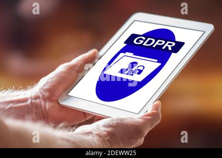 Man holding a tablet showing gdpr concept Stock Photo