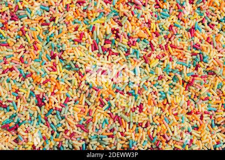 Close-up of colorful sweet noodles. Sugar whims. Stock Photo