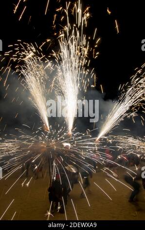 Correfoc performance by the devils also called Els Diables. Stock Photo