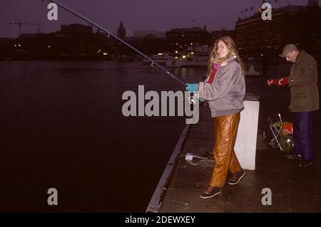 SISSEL KYRKJEBÖ Norwegian singer and artist fishing in Stockholm Stock Photo