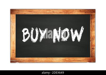 BUY  NOW text written on black wooden frame school blackboard. Stock Photo