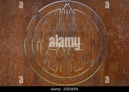 ZUTPHEN, NETHERLANDS - Nov 03, 2020: Gradient green and gray forming a graphic emblem in rusty metal showing church towers of medieval Hanseatic town Stock Photo