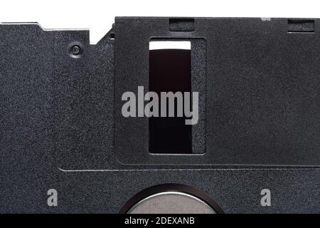 floppy diskette in a black square plastic case with open magnetic disk, obsolete computer technology device memory carrier 90s isolated on white backg Stock Photo