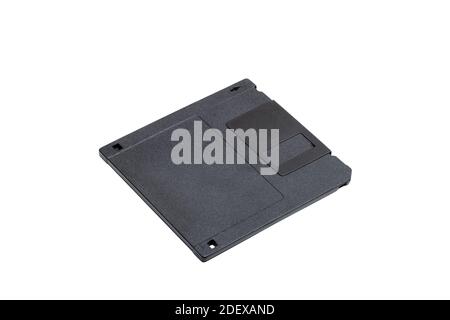floppy disk in a black square plastic label case with copy space, obsolete computer technology device memory carrier 80s isolated on white background, Stock Photo