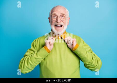 Photo of cheerful granddad arms hold water gun have good mood isolated ...