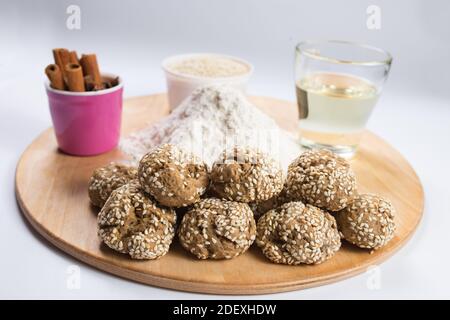 Home made gingerbreads in focus and ingredients blured on background. Stock Photo