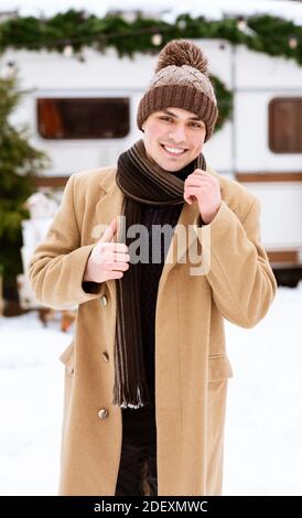 Winter Fashion. Portrait Of Handsome Stylish Young Man Posing Outdoors At Campsite Stock Photo