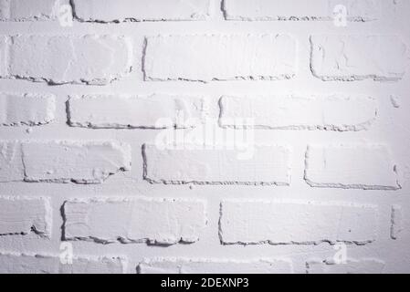 closeup white brick decorative wall texture White brick wall, perfect as a background, square photograph. Stock Photo