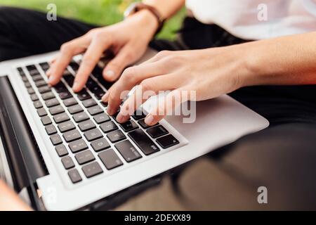 Close-up image of hands, fingers, typing on the keyboard text Stock Photo
