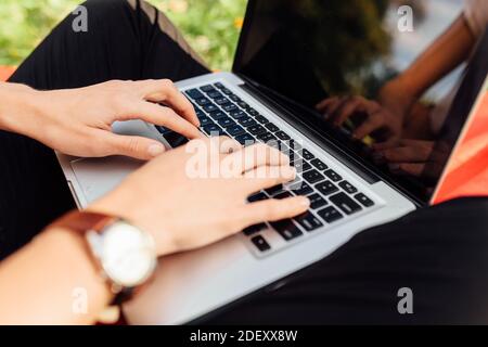 Close-up image of hands, fingers, typing on the keyboard text Stock Photo