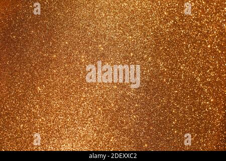 Blurred Brown sparkles, de-focused christmas abstract background, brown glitter texture Stock Photo