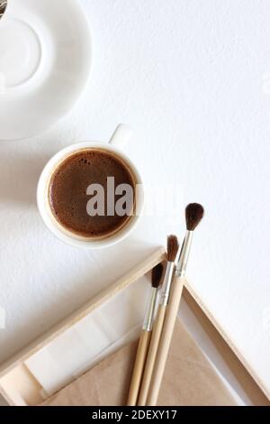 Download Design Mockup With Copy Space Top View Of Composition With Coffee Wooden Box With Kraft Paper And Painting Brushes Stock Photo Alamy