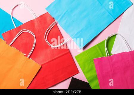 Background from various colored paper bags, top view. Stock Photo
