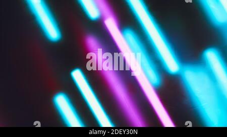 Abstract colorful background. Diagonal oriented pink and cyan light bars. Defocused light lines. Stock Photo