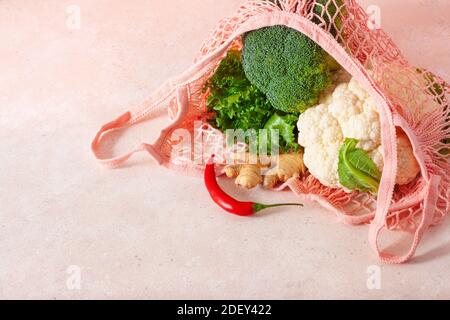 fruits vegetables in reusable mesh cotton bag, plastic free zero waste concept Stock Photo