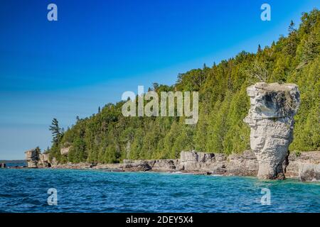 Flower pot behind as seen from a cruise boat, Lake Huron, ON. Spectacular scenery in the summer in Georgian Bay in ON, Canada. There are over 30,000 i Stock Photo