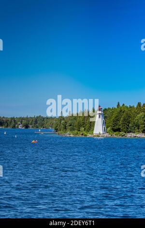 Tobermory and the lighthouse seen from the Lake Huron. Spectacular scenery in the summer in Georgian Bay in ON, Canada. There are over 30,000 islands Stock Photo