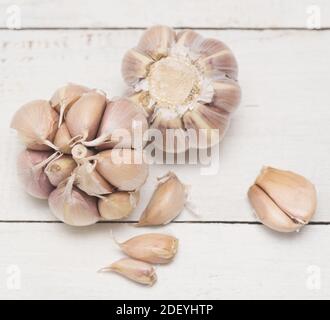 Garlic on wooden background Stock Photo