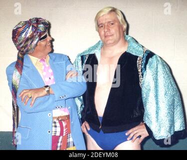 **FILE PHOTO** WWE Legend Pat Patterson Has Passed Away. Pat Patterson with The Grand Wizard (Ernie Roth) in 1979. Credit: George Napolitano/MediaPunch Stock Photo