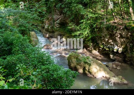 black river that comes from the marmore waterfalls in the middle of nature Stock Photo