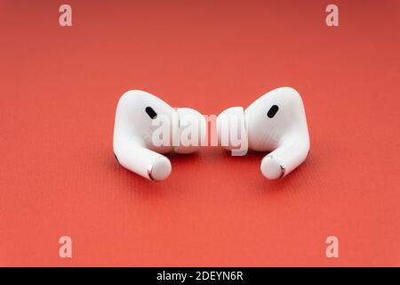 Kuala Lumpur, Malaysia - December 1,2020 : AirPods Pro on red background Stock Photo
