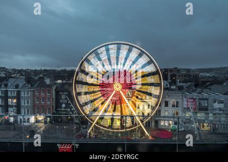 Cork City, Cork, Ireland. 02nd December, 2020. A thirty meter high Ferris Wheel has been installed on the Grand Parade as part of GLOW, A Cork Christmas Celebration which opened on the 02nd December  and will run up to Christmas.  Organised by Cork City Council the festival attracts thousands to the city every year.  Credit; David Creedon / Alamy Live News Stock Photo