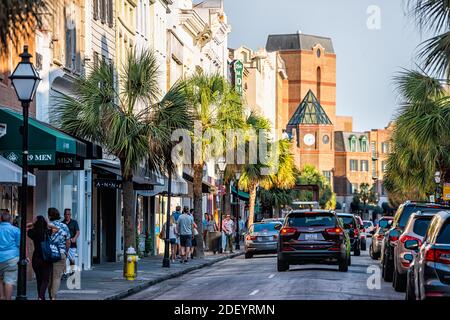 Charleston, USA - May 12, 2018: Downtown district in city with King street in South Carolina with cars and people in southern town shopping and view o Stock Photo