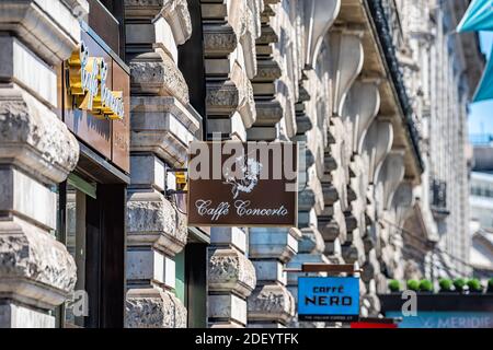 London, UK - June 22, 2018: Italian cafe Caffe Concerto restaurant building entrance on Piccadilly road street and Cafe Nero sign Stock Photo