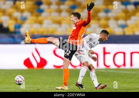 Kharkov, Ukraine. 01st Dec, 2020. Mykola Matviyenko of Shakhtar (L) fights for the ball with Lucas Vazquez of Real Madrid (R) during the UEFA Champion Stock Photo