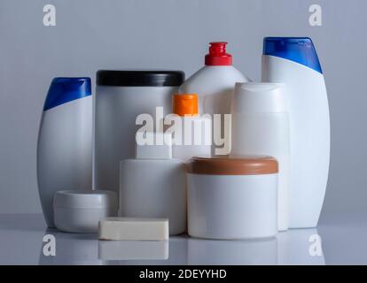 Banner Hair and body care cosmetics white bottles on white background Copy space selective focus Stock Photo