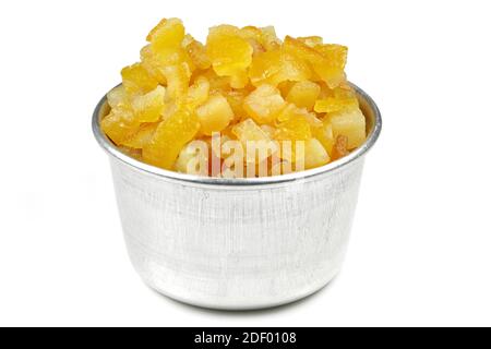 candied orange peel in an aluminium bowl isolated on white background Stock Photo