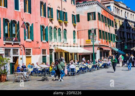 Lively terraces in the Campo Santo Stefano is a city square near the Ponte dell'Accademia, in the sestiere of San Marco. Venice, Veneto, Italy, Europe Stock Photo