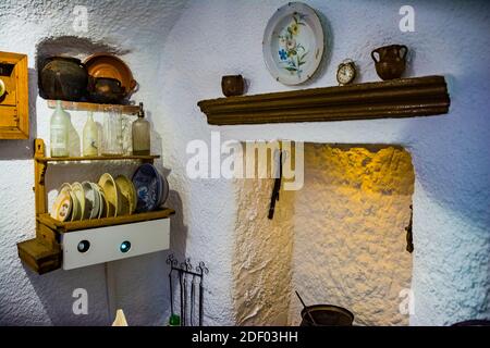 Corner of the kitchen of a cave house. Cave-Museum of traditional culture. Centro de Interpretacion Cuevas de Guadix. This museum will let you take a Stock Photo