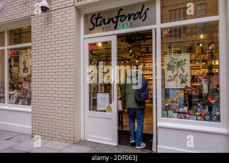 Stanfords map and travel bookshop in Covent Garden, London. After 118 years in Long Acre the store relocated to nearby Mercer Walk in 2019. Stock Photo
