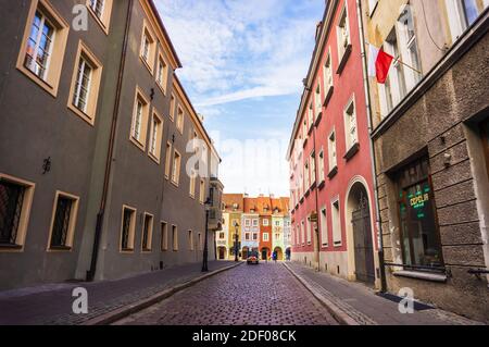 POZNAN, POLAND - Nov 12, 2018: Small street leading to the old city square Stock Photo