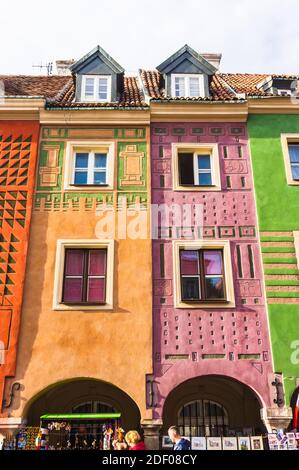 POZNAN, POLAND - Nov 12, 2018: Yellow and pink building in the old city square Stock Photo