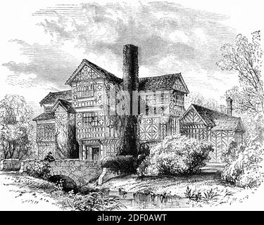 A 19th Century view of Little Moreton Hall, aka Old Moreton Hall, a moated half-timbered manor house near Congleton in Cheshire, England. The earliest parts of the house were built for the prosperous Cheshire landowner William Moreton in about 1504–08, and the remainder was constructed by successive generations of the family until about 1610. The fortunes of the Moreton family as supporters of the Royalist cause, declined during the English Civil War. The hall was used to billet Parliamentary soldiers in 1643. Stock Photo
