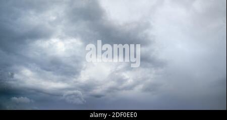 Clouds in the overcast sky view. Climate, environment and weather concept sky background. Stock Photo